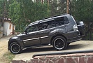Pajero тюнинг купить. Накладки на задний бампер Mitsubishi